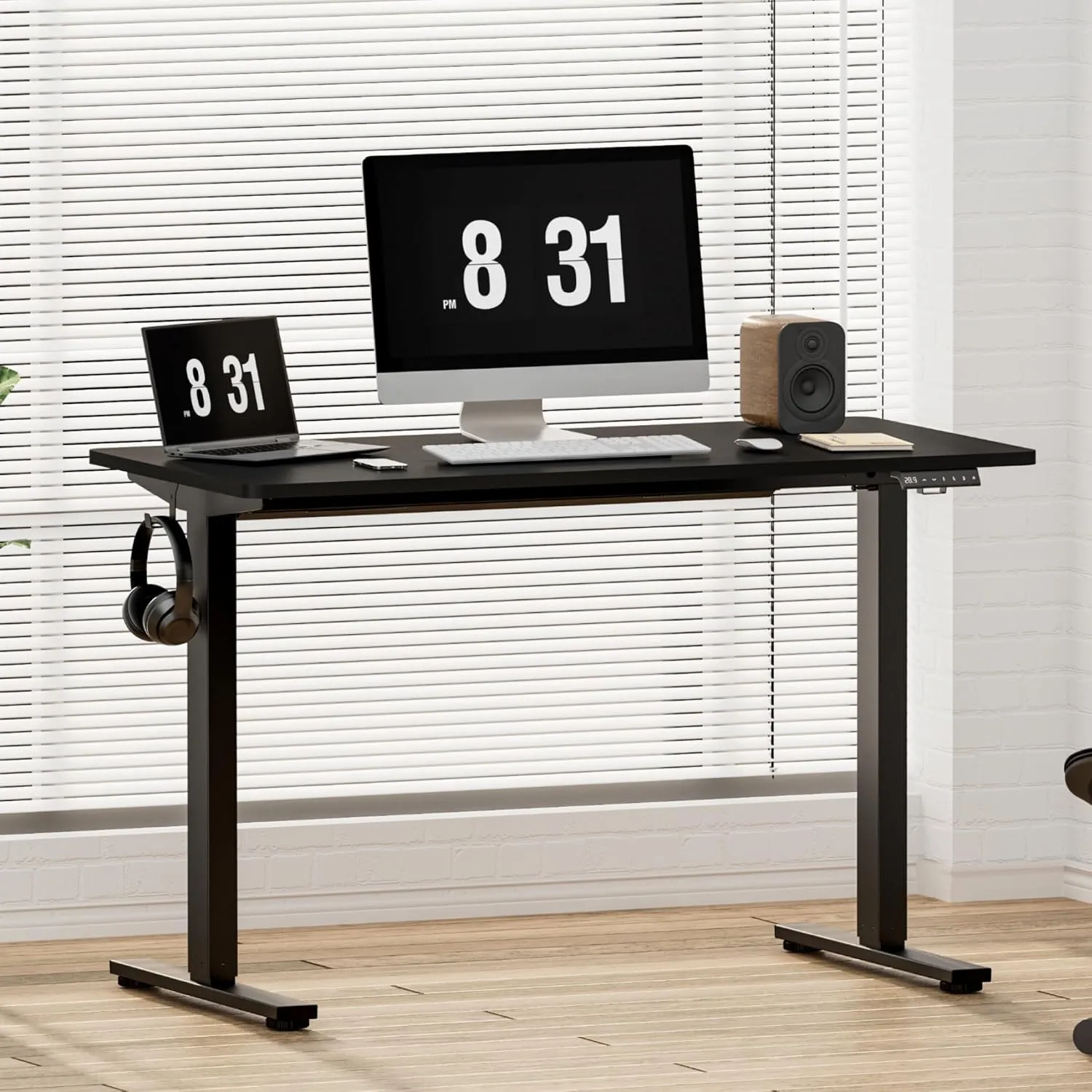 Flexispot EF1 standing desk in a small bedroom with a single monitor and keyboard setup